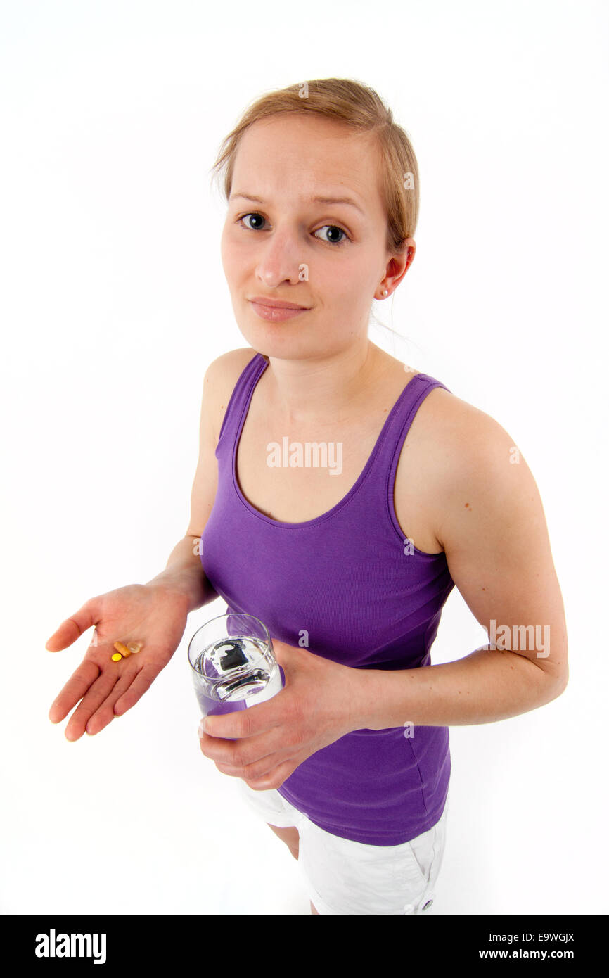 Young woman takes a tablet Stock Photo