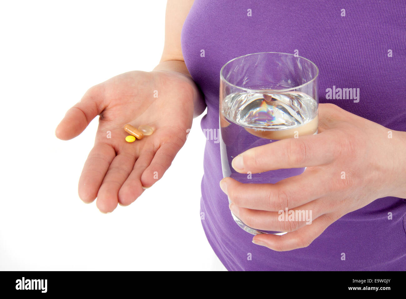 Young woman takes a tablet Stock Photo
