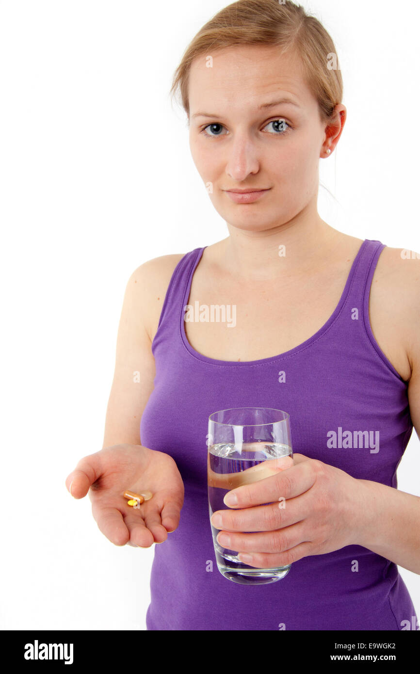 Young woman takes a tablet Stock Photo