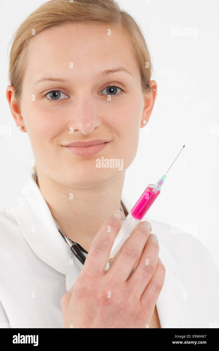 Woman doctor gives injection hi-res stock photography and images - Alamy