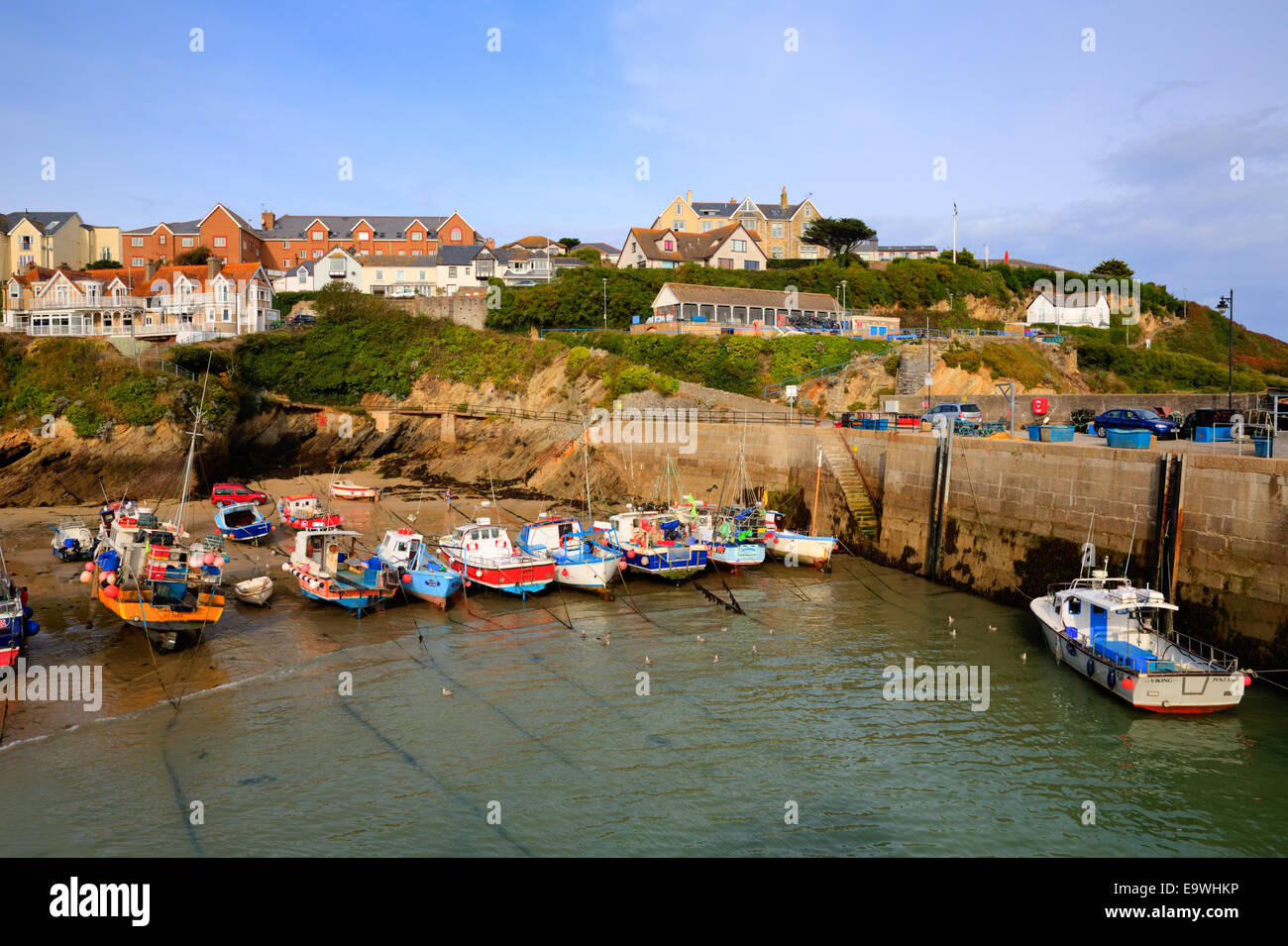 Newquay harbour North Cornwall England UK with boats and sea wall Stock Photo