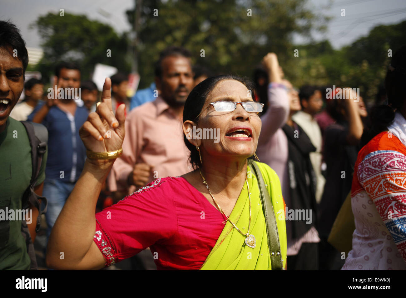 Dhaka, Bangladesh. 3rd Nov, 2014. Ganajagaran Mancha rejoices over the death verdict awarded to Bangladesh Jamaat-e-Islami leader Md Kamaruzzaman's by taking out a procession from Shahbagh on Monday, 3rd November 2014. Dhaka, Bangladesh. Today the four-strong Appellate Division bench headed by Justice Surendra Kumar Sinha gives the final verdict on the former Al-Badr commander. Credit:  ZUMA Press, Inc./Alamy Live News Stock Photo