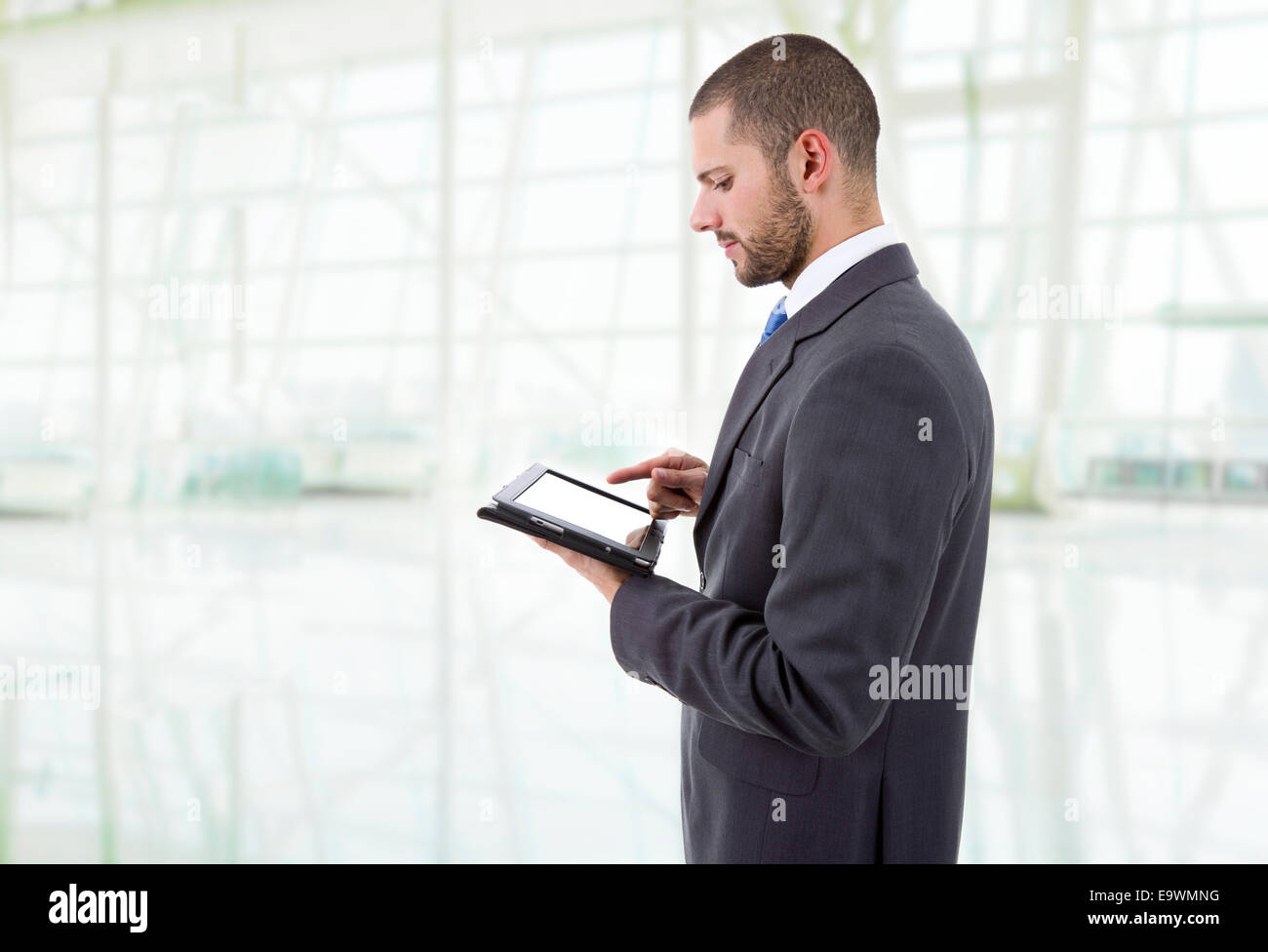 businessman using touch pad of tablet pc at the office Stock Photo - Alamy