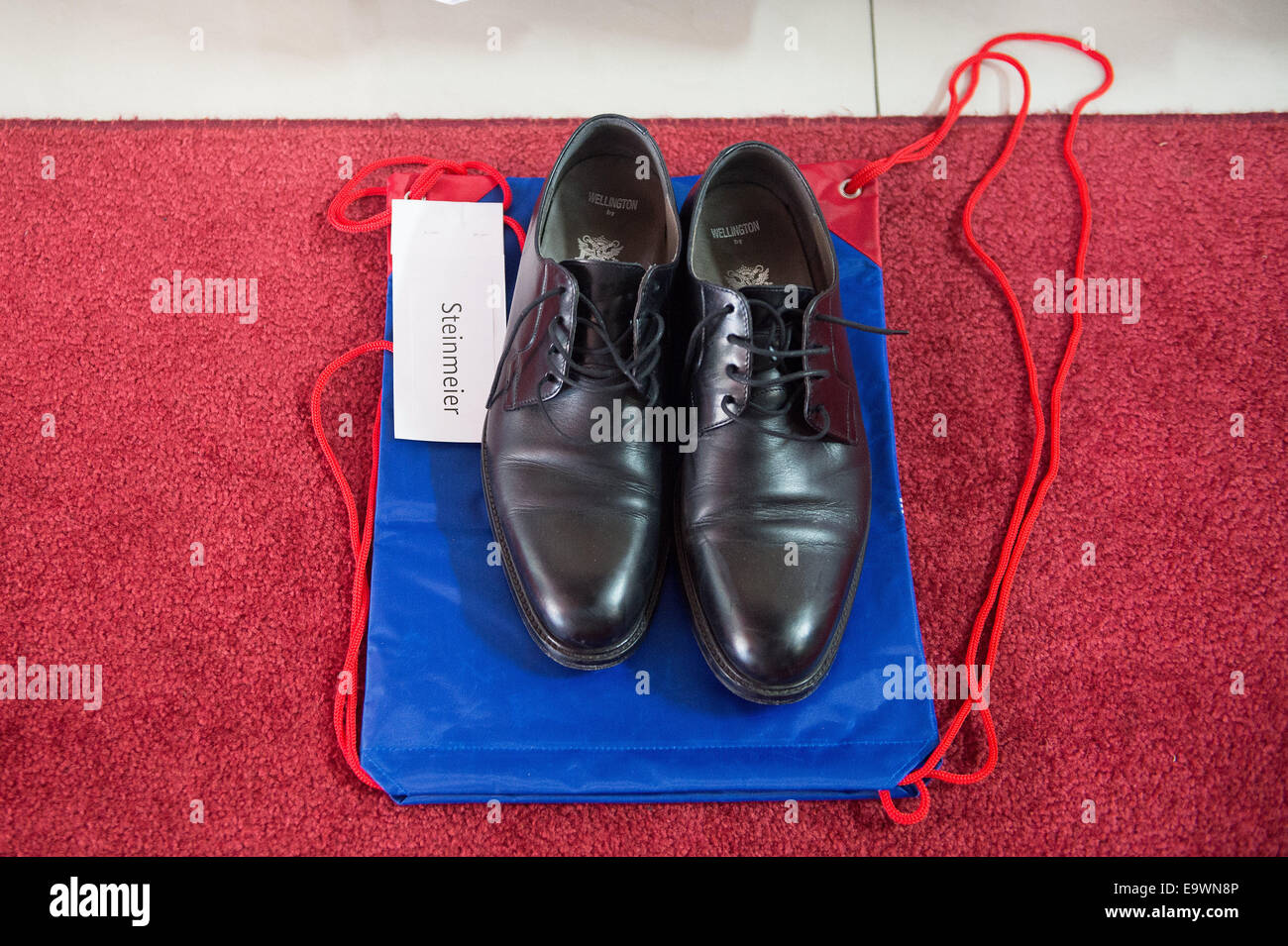 German Foreign Minister Frank-Walter Steinmeier's shoes while he visits the  Istiqlal Mosque in Jakarta, Indonesia, 03 November, 2014. Photo: MAURIZIO  GAMBARINI/dpa Stock Photo - Alamy