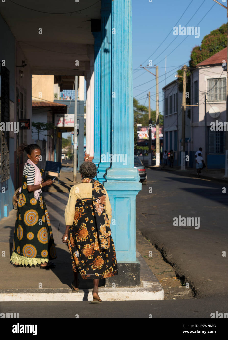 Two women in a street in Diego Suarez Madagascar Stock Photo