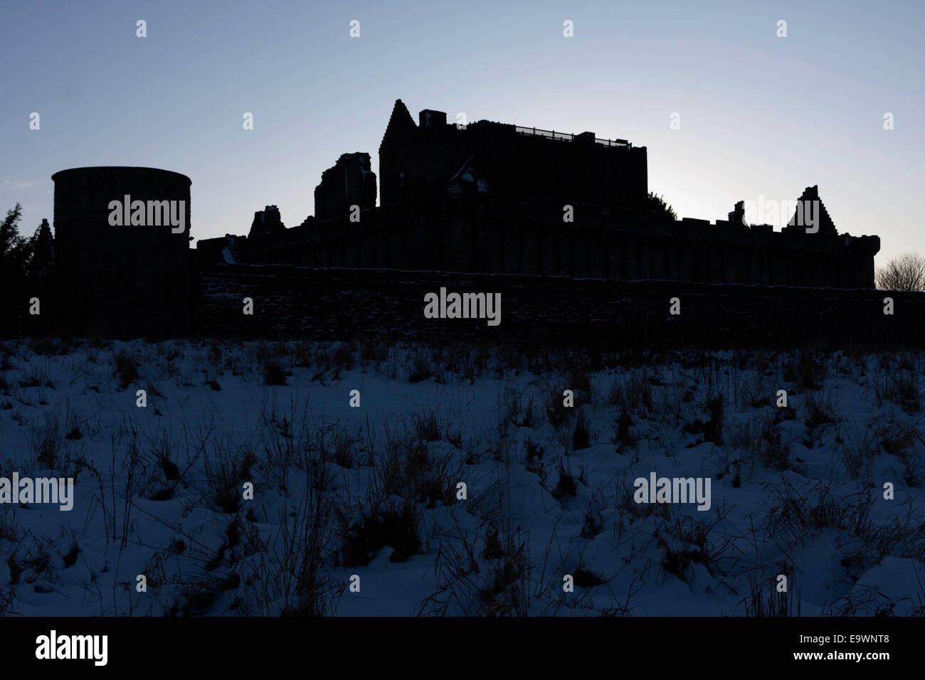 A silhouette of Edinburgh Craigmillar Castle during the afternoon night. Stock Photo