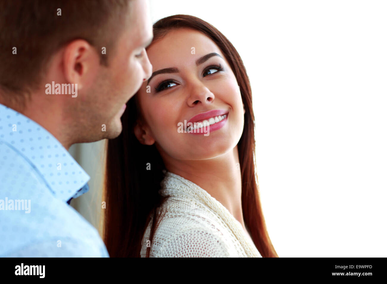 Smiling couple looking at each other Stock Photo - Alamy