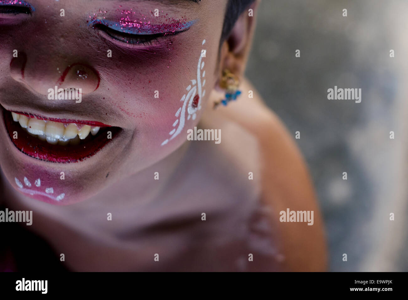 Boy painted his face at time of Gajan/Charak festival, West Bengal, India. Stock Photo