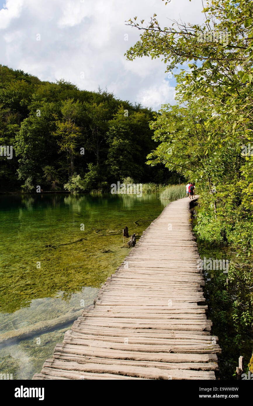 Wooden boardwalks across a lake in Plitvice Lakes National Park, Croatia Stock Photo