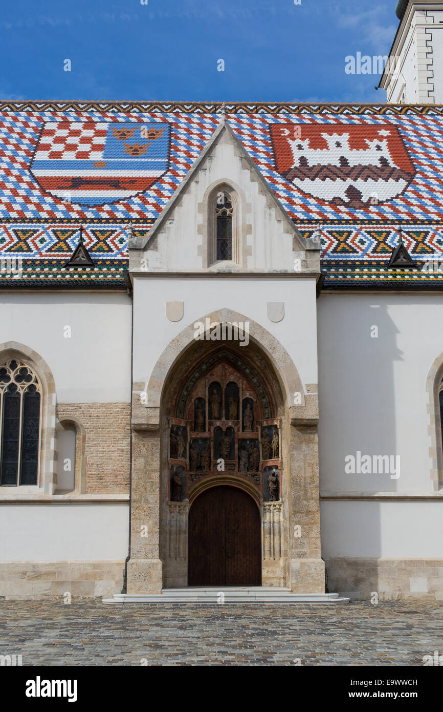 Main entrance to and tiled roof of St Mark's Church, Zagreb, Croatia Stock Photo