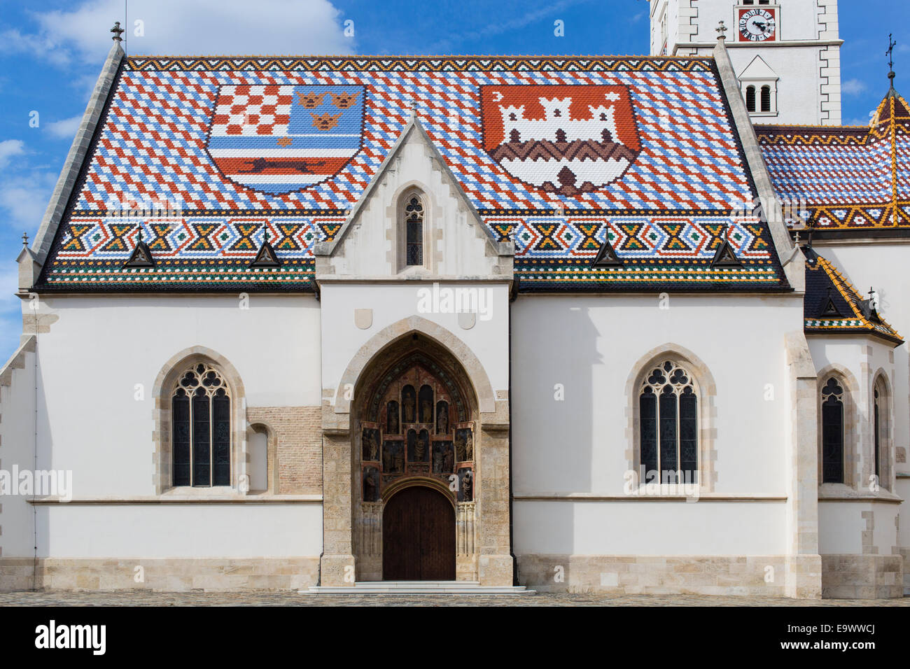 Main entrance to and tiled roof of St Mark's Church, Zagreb, Croatia Stock Photo