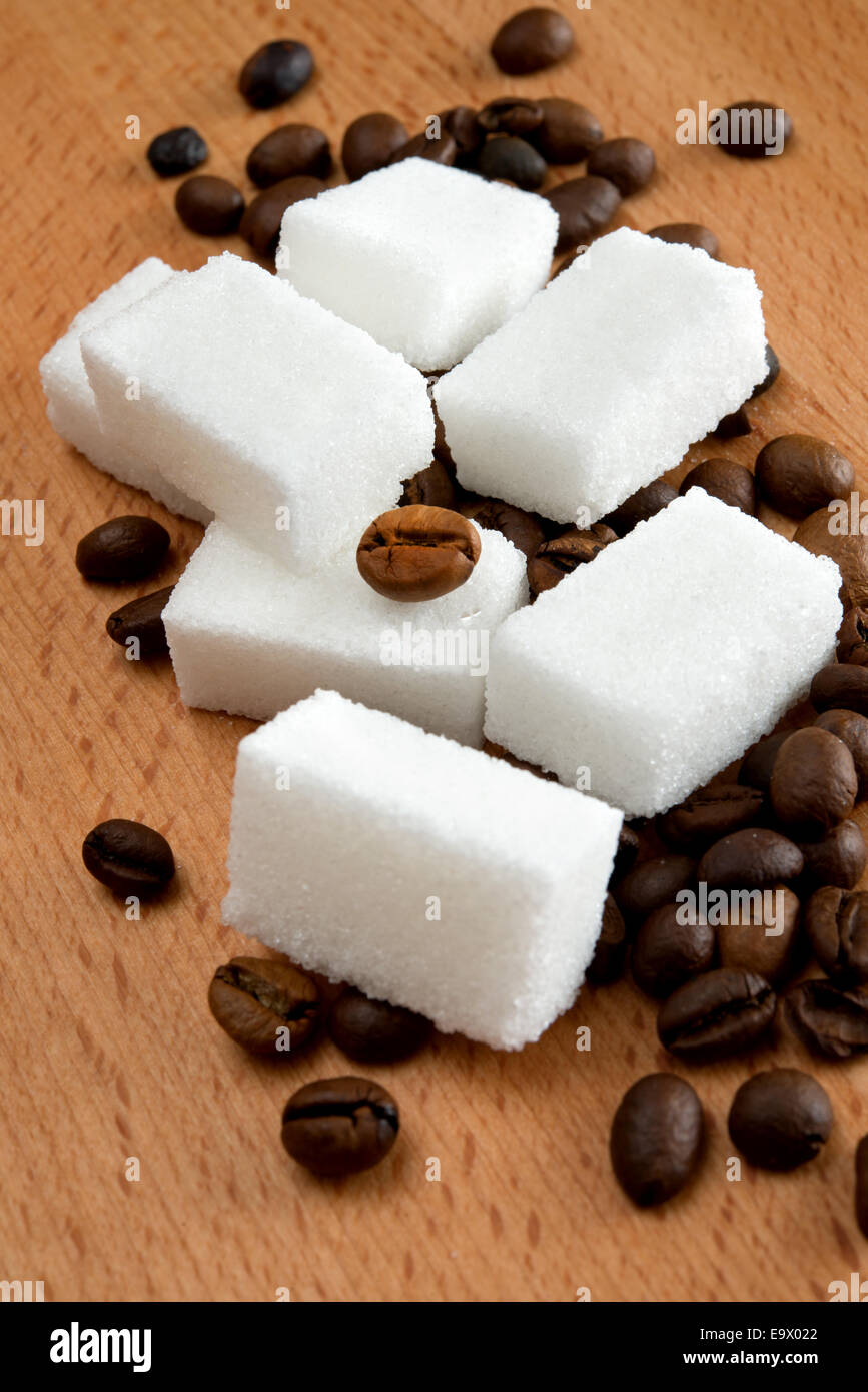 cube sugar and coffee on wooden table Stock Photo