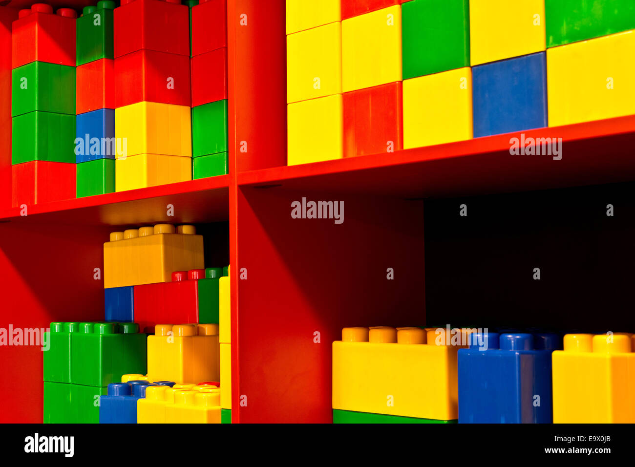 detail of colored cubes in the red shelf Stock Photo