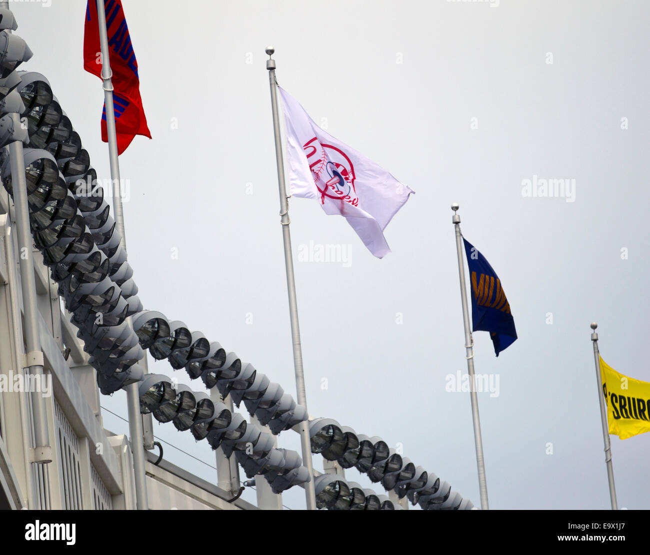 Flags flying over Yankee Stadium Stock Photo Alamy
