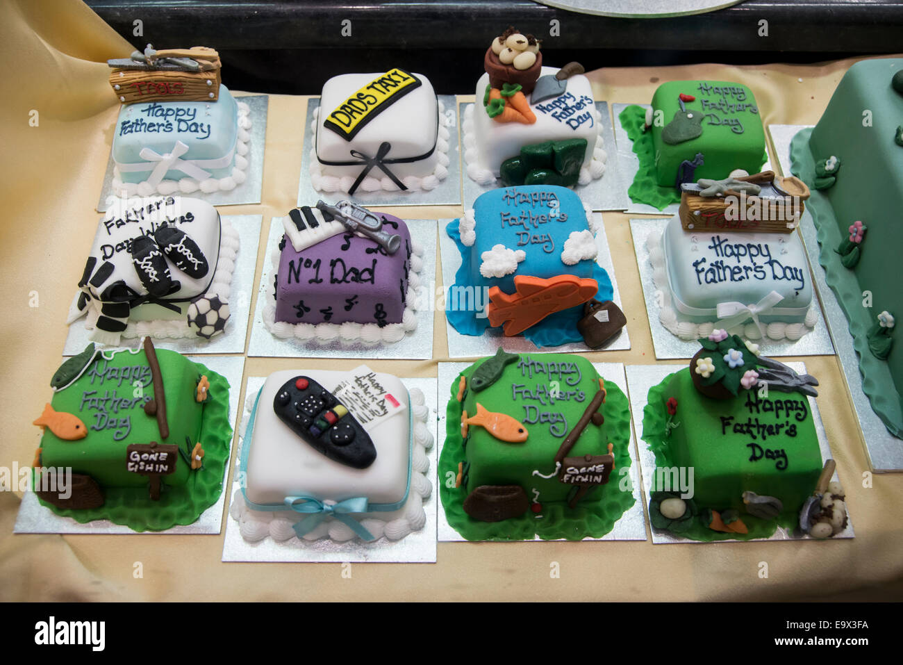 Various small celebration cakes displayed in The Cake Shop in the