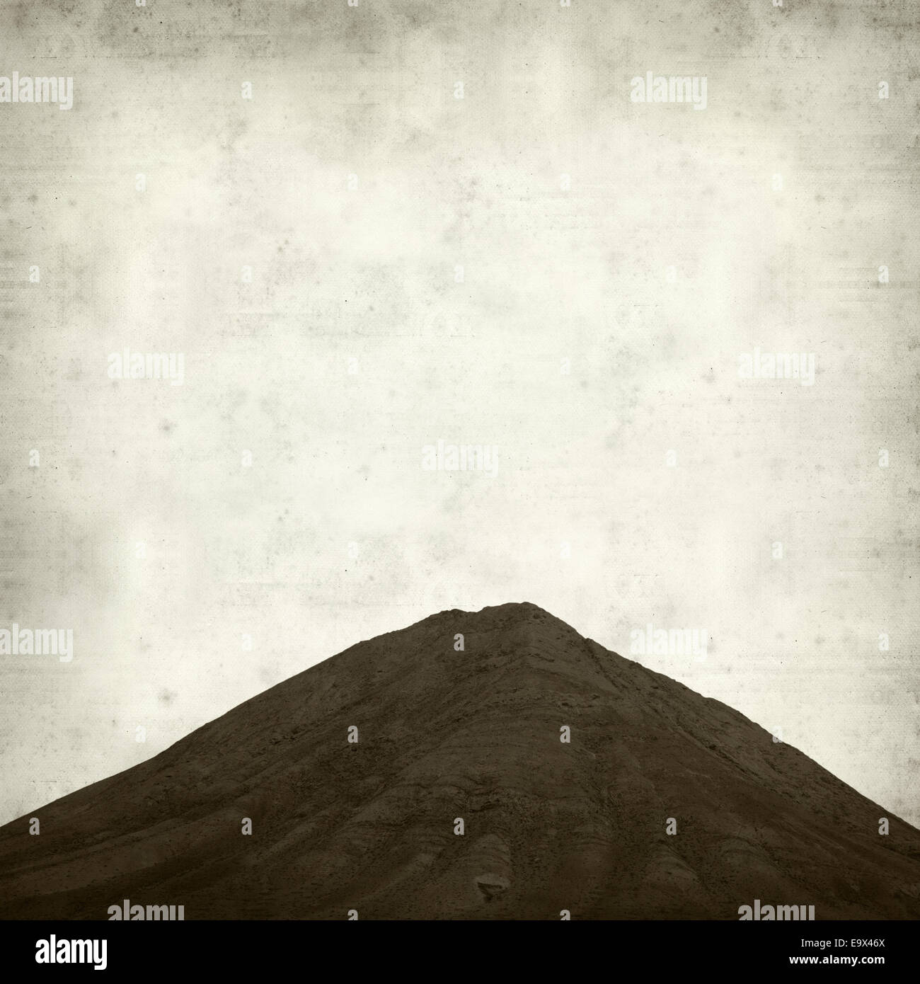 textured old paper background with Tindaya, sacred mountain of Fuerteventura Stock Photo