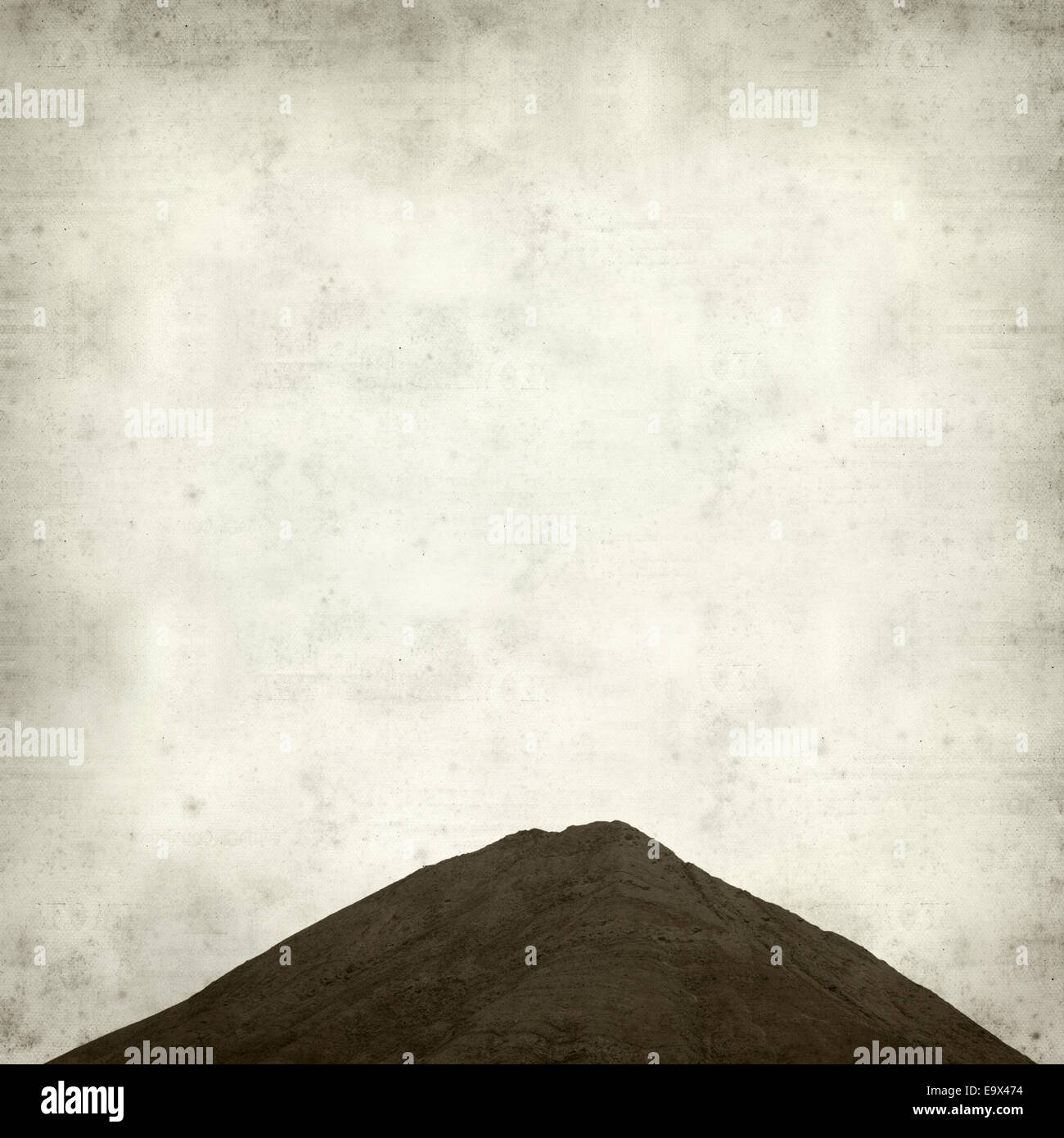 textured old paper background with Tindaya, sacred mountain of Fuerteventura Stock Photo