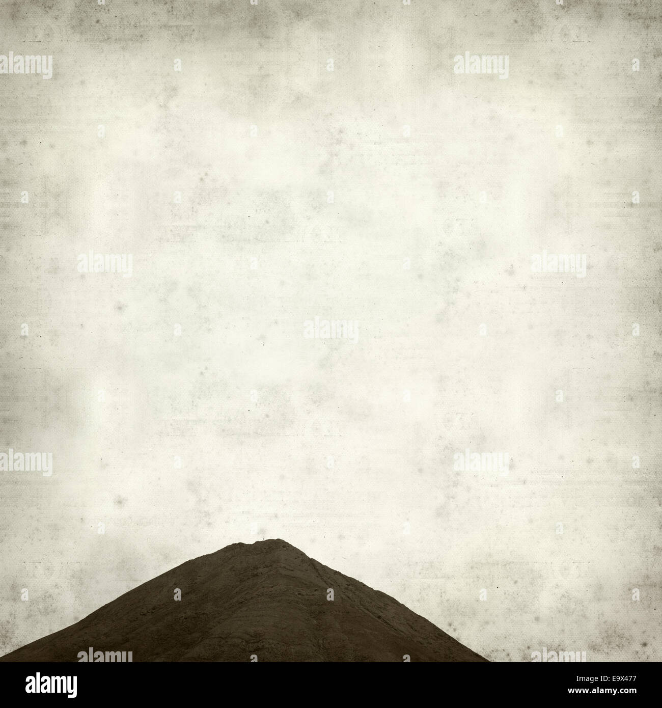 textured old paper background with Tindaya, sacred mountain of Fuerteventura Stock Photo