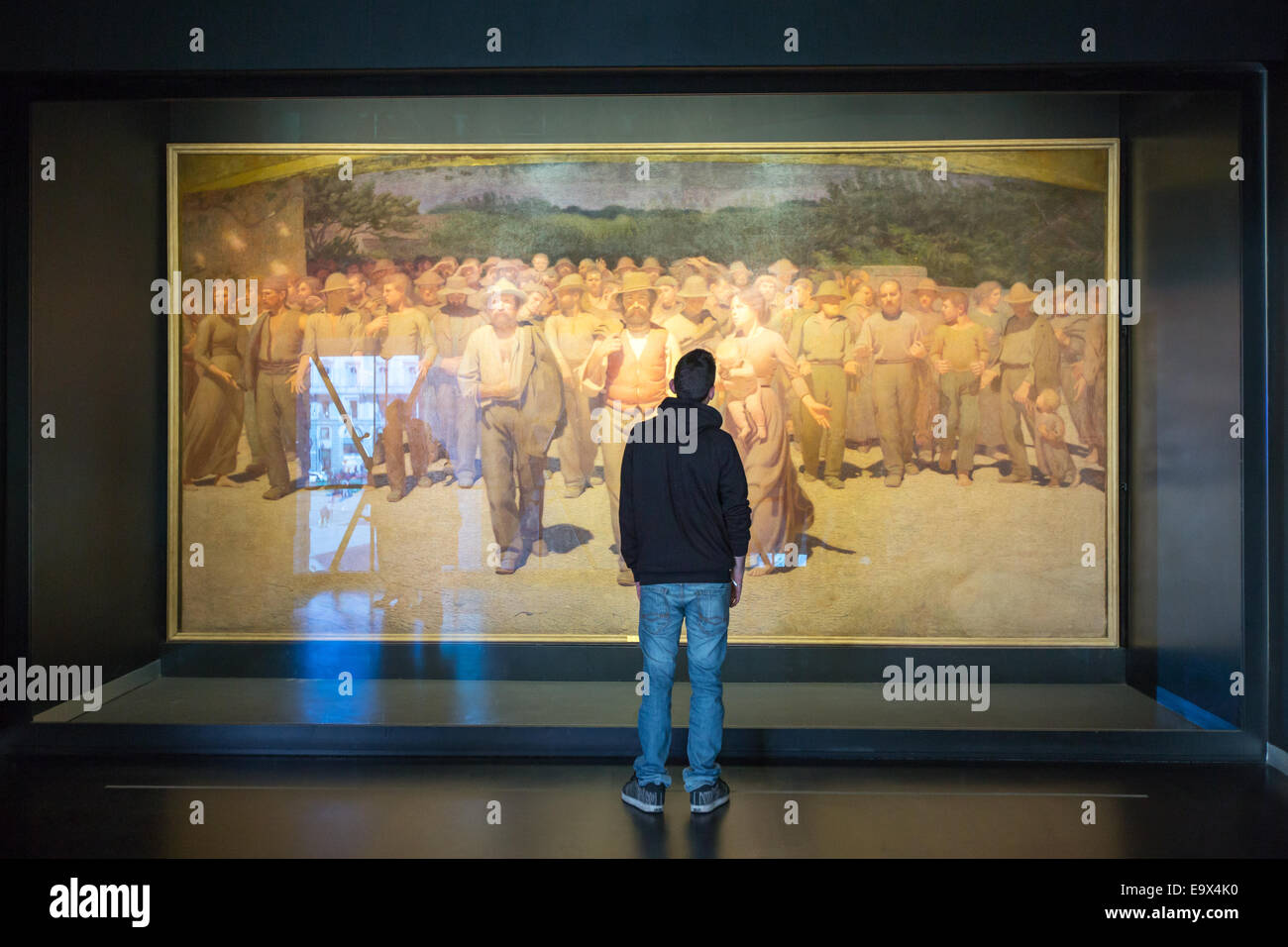 Italy, Milan, people in front of 'The Fourth Estate' painting of Pellizza da Volpedo, in the Museum of the twentieth century Stock Photo