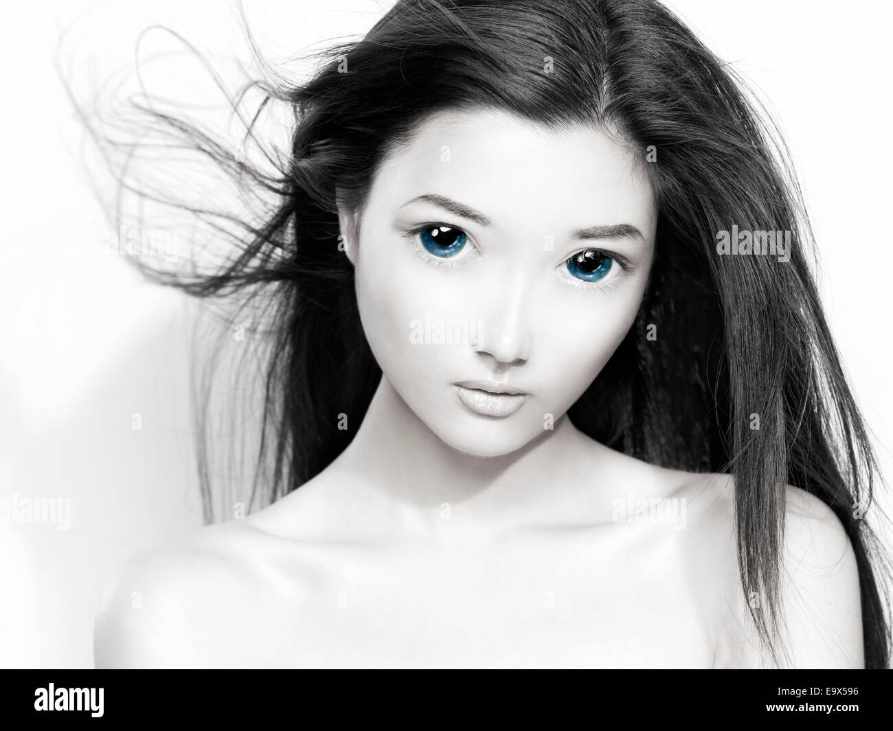 License and prints at MaximImages.com - Cute asian young woman face with bi...