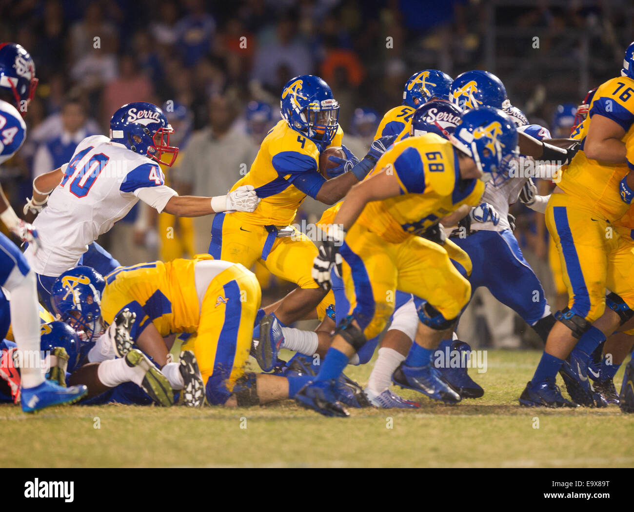 October 4, 2014, La Puente, CA.Bishop Amat lancers running back (4) Torreahno Sweet in action during the Bishop Amat upset of the Cavaliers at Bishop Amat high school on October 3, 2014. The Cavaliers who are usually a nationally ranked high school football team, were upset by Bishop Amat 14 - 7. (Mandatory Credit: Ed Ruvalcaba/MarinMedia.org) (Complete photographer, and company credit required) Stock Photo