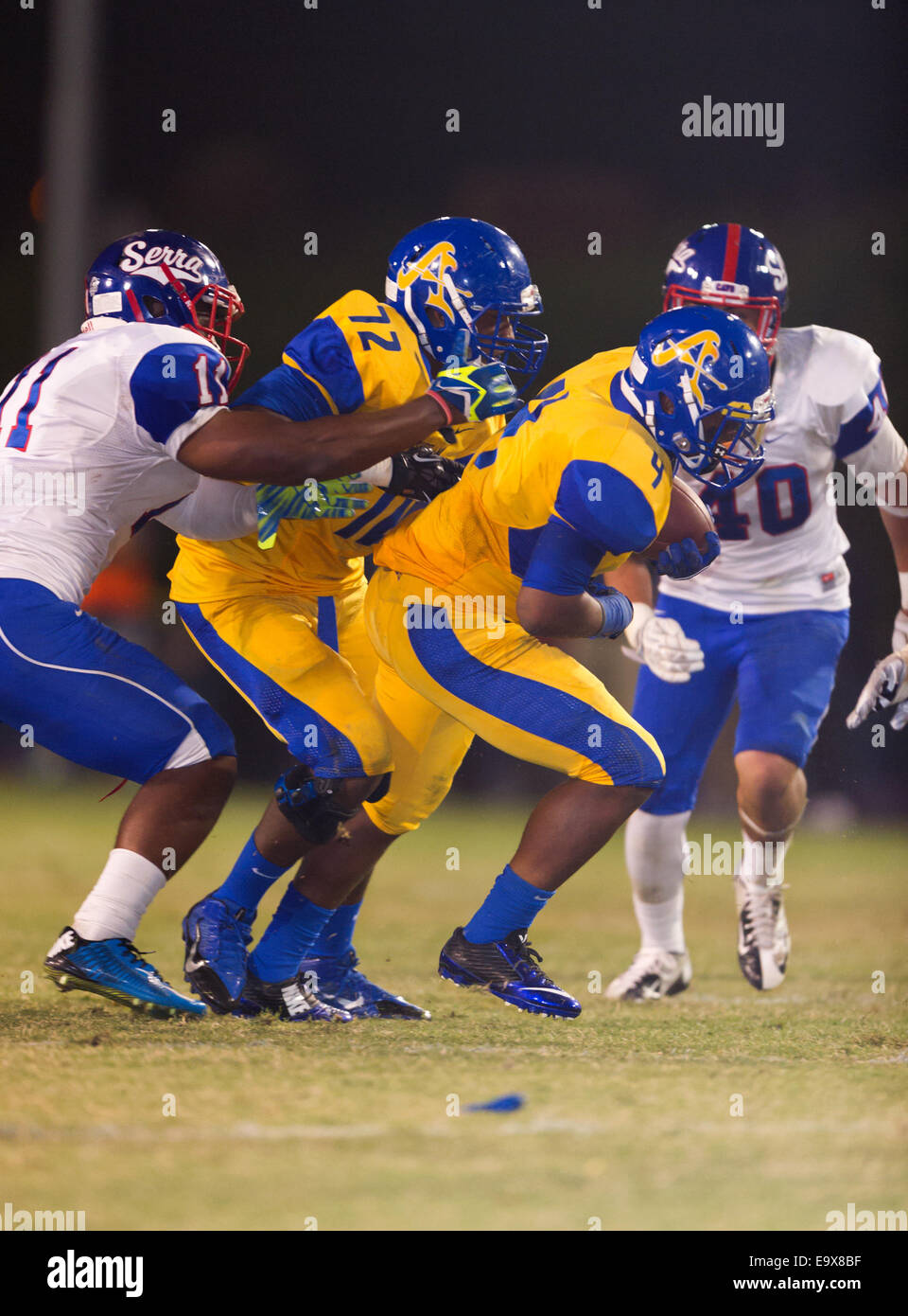 October 4, 2014, La Puente, CA.Bishop Amat lancers running back (4) Torreahno Sweet in action during the Bishop Amat upset of the Cavaliers at Bishop Amat high school on October 3, 2014. The Cavaliers who are usually a nationally ranked high school football team, were upset by Bishop Amat 14 - 7. (Mandatory Credit: Ed Ruvalcaba/MarinMedia.org) (Complete photographer, and company credit required) Stock Photo