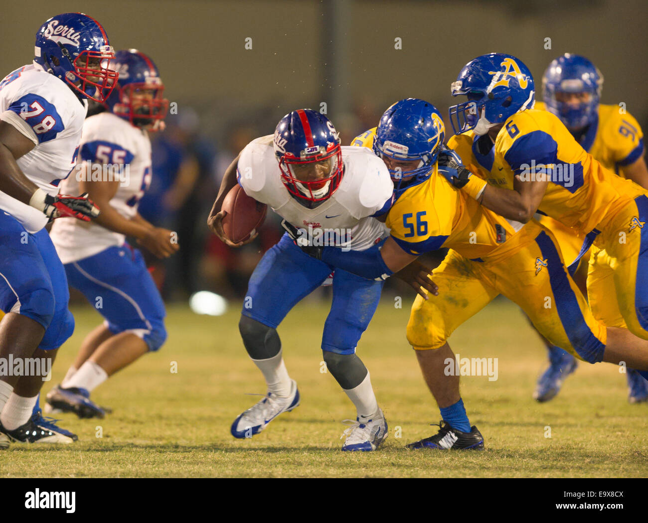 October 4, 2014, La Puente, CA.Gardena Serra cavaliers quarterback (14) Khalil Tate in action during the Bishop Amat upset of the Cavaliers at Bishop Amat high school on October 3, 2014. The Cavaliers who are usually a nationally ranked high school football team, were upset by Bishop Amat 14 - 7. (Mandatory Credit: Ed Ruvalcaba/MarinMedia.org) (Complete photographer, and company credit required) Stock Photo
