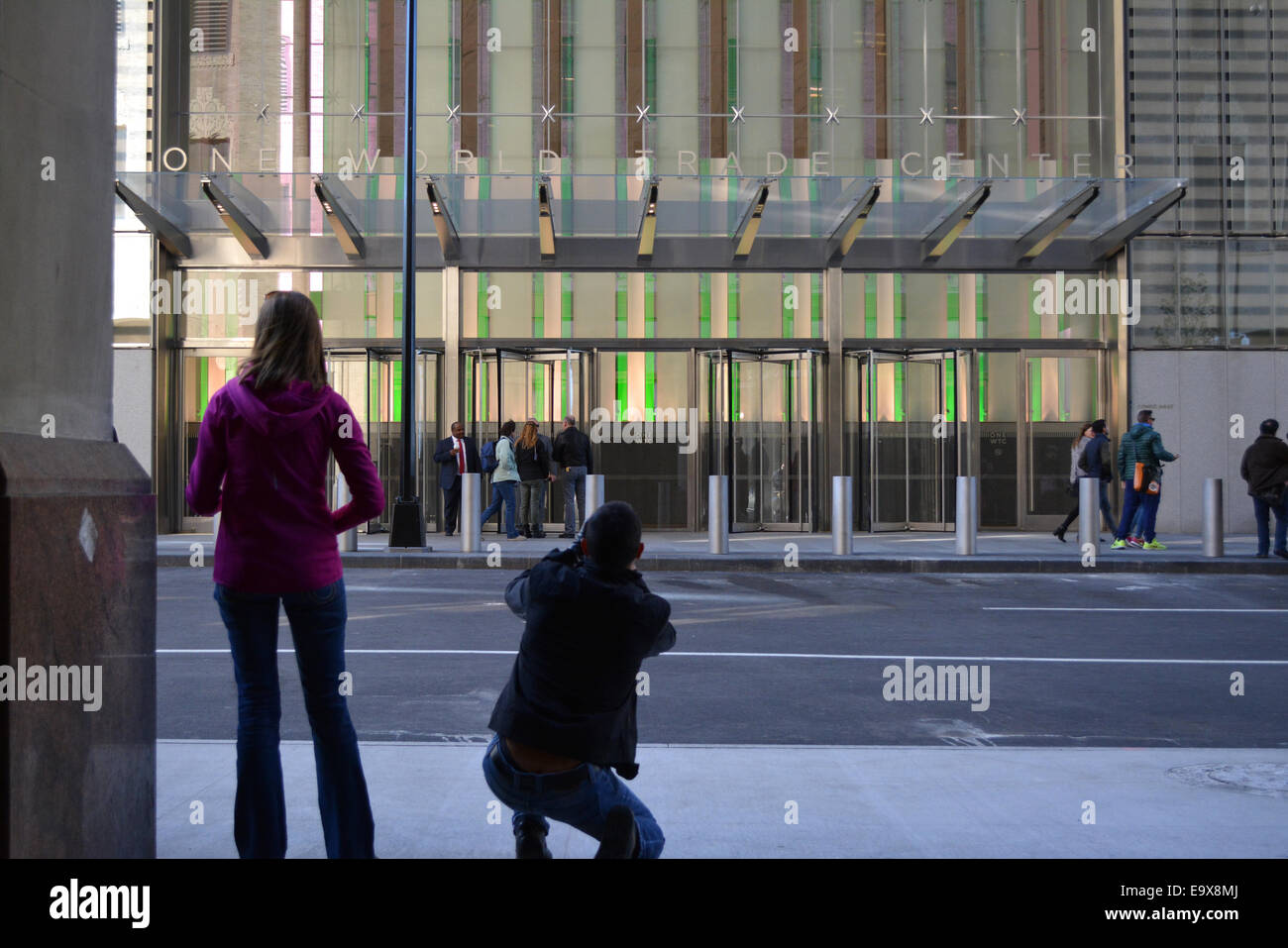 New York, USA. 02nd Nov, 2014. People taking photos of the entrance to One World Trade Center on the day it opens to workers in Lower Manhattan. Credit:  Christopher Penler/Alamy Live News Stock Photo