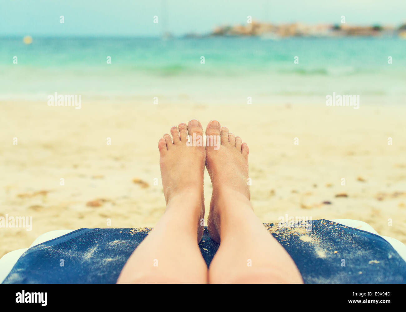 Woman legs beach lying hires stock photography and images Alamy