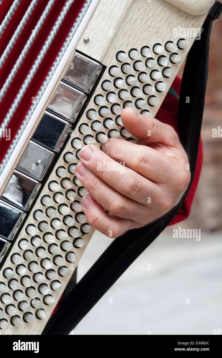 Italy, Lombardy, Man Playing  Accordion Stock Photo