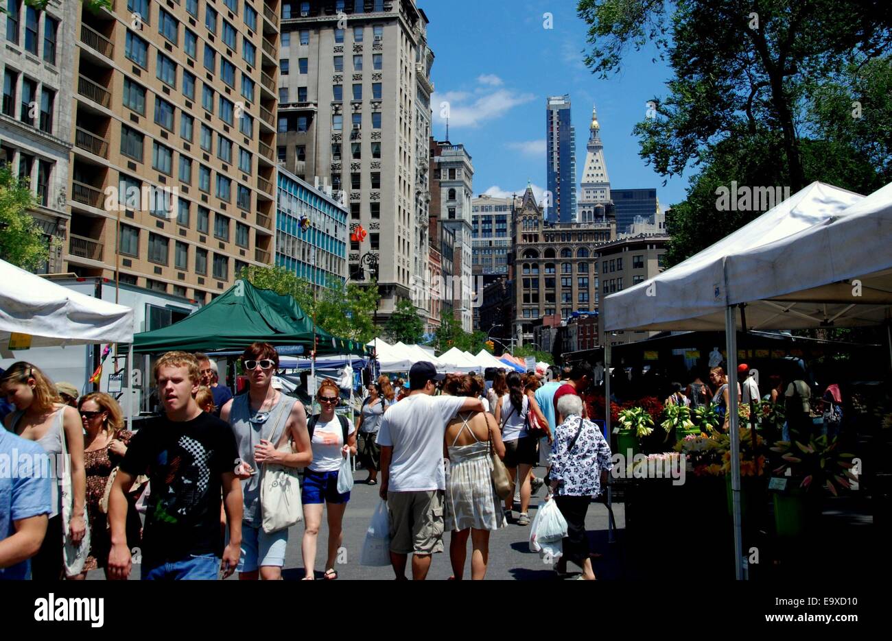 NYC The bustling Union Square Farmer's Market lined with tents selling