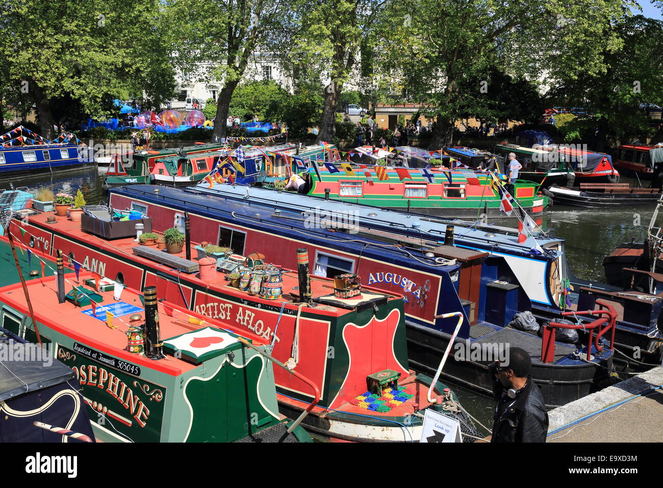 The colourful boats and barges of the annual summer Canal Cavalcade, in