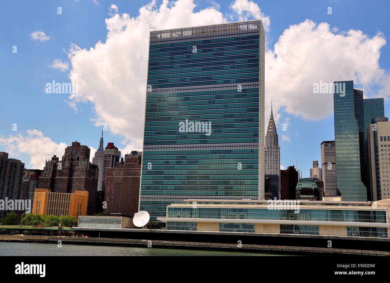 NYC:  The United Nations Secreteriat Building (center) and General Assembly Hall seen from the East River * Stock Photo