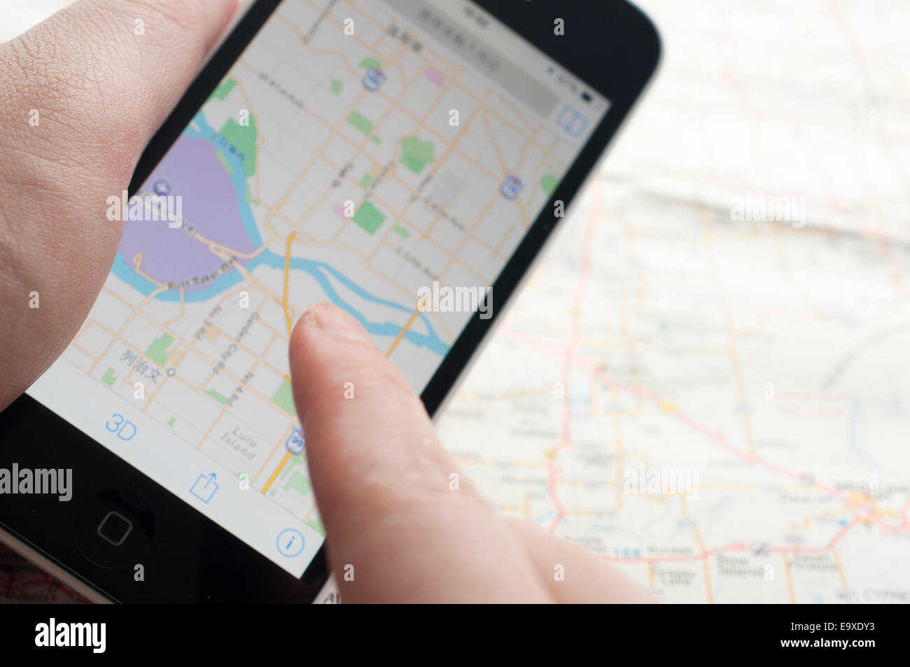 Finding destination on GPS navigator smartphone Stock Photo
