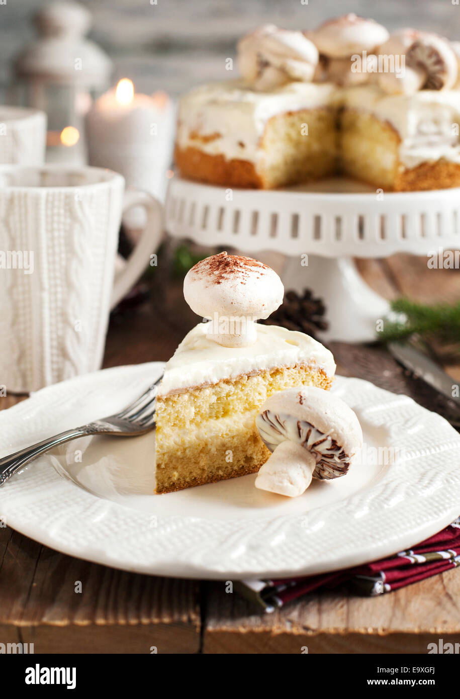 Vanilla Cake decorated with meringue mushrooms Stock Photo Alamy