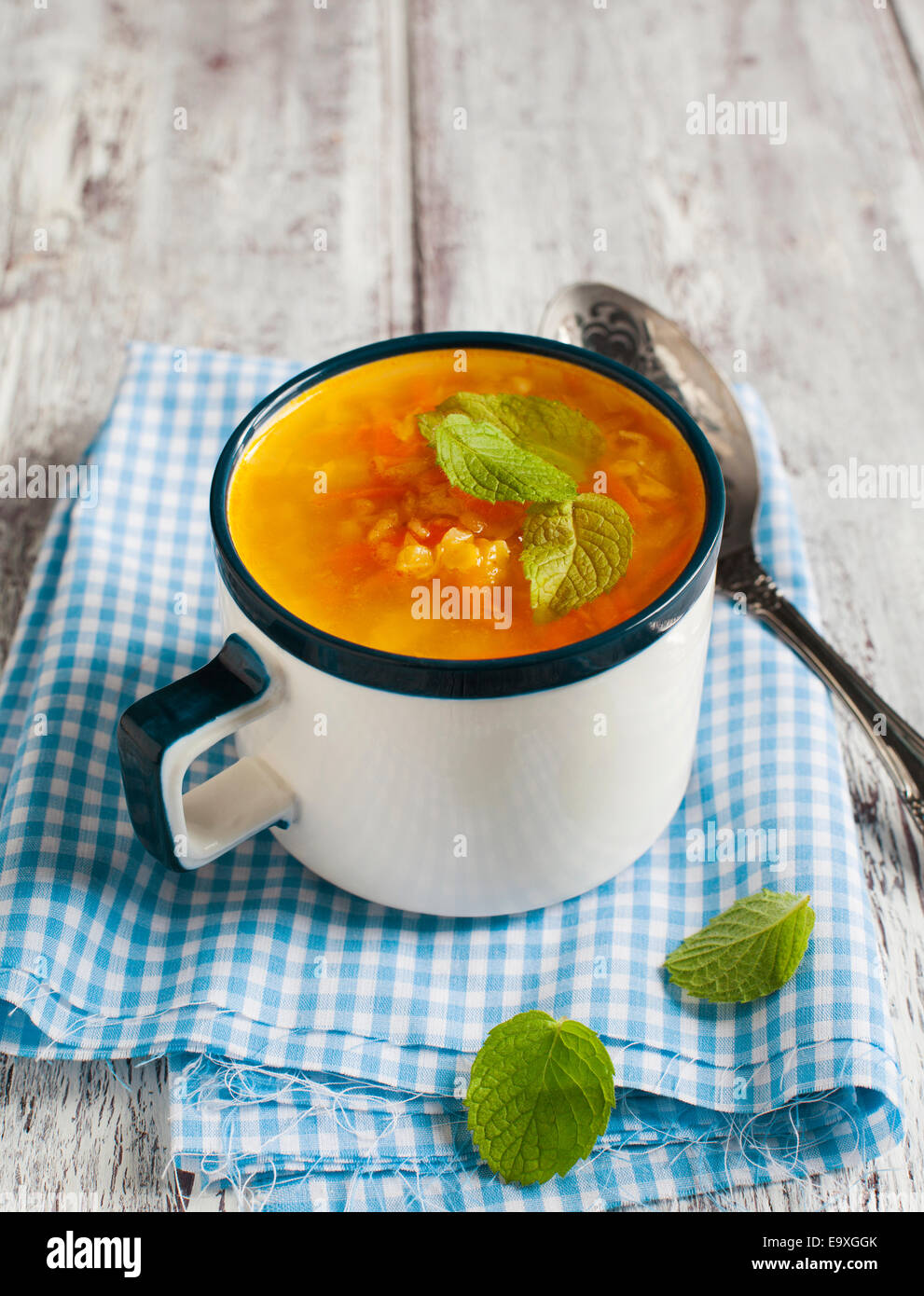 Carrot and ginger soup with red lentils Stock Photo