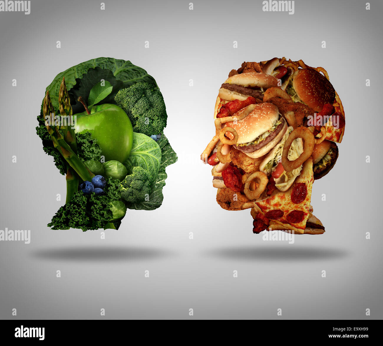 Lifestyle choice and dilemma concept as a two human faces one made of fresh green vegetables and fruit and the other head shaped with greasy fast food as hamburgers and fried foods as a symbol of nutrition facts and healthy living issues. Stock Photo