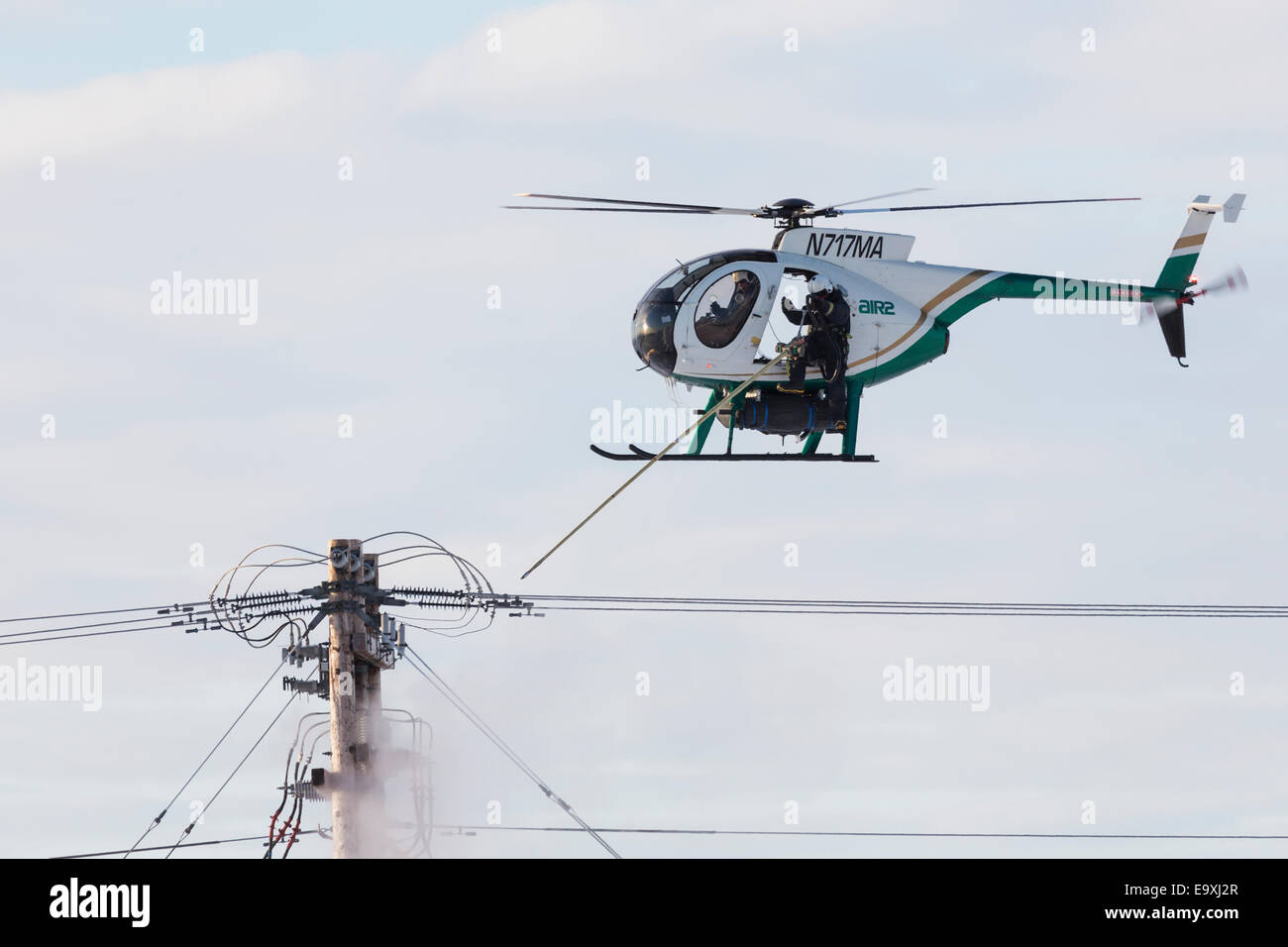 Voltage,Cleaning,Helicopter,Alaska,Insulator Stock Photo