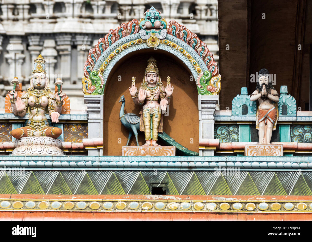 Lord Murugan Statue on glorious covered walkway to Thiruvannamalai temple. Stock Photo