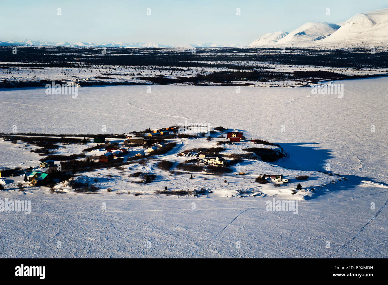 Aerial winter view of 'The Rock,' a spit that houses some of the residents of Iliamna, Alaska, Southwestern Alaska Stock Photo