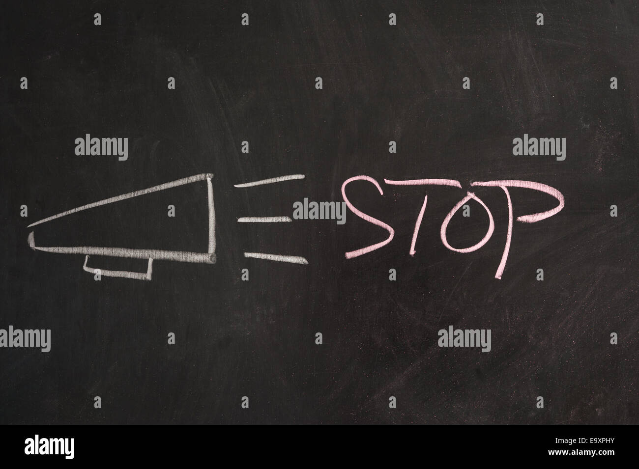 Stop word with loud speaker concept drawn on blackboard Stock Photo
