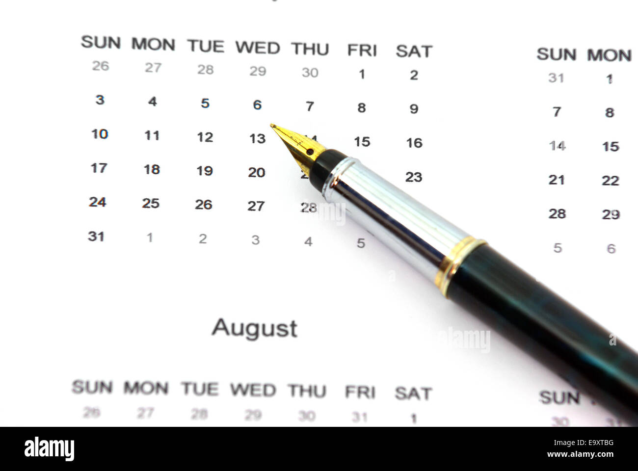 Close up image of a pen on a calendar. Stock Photo