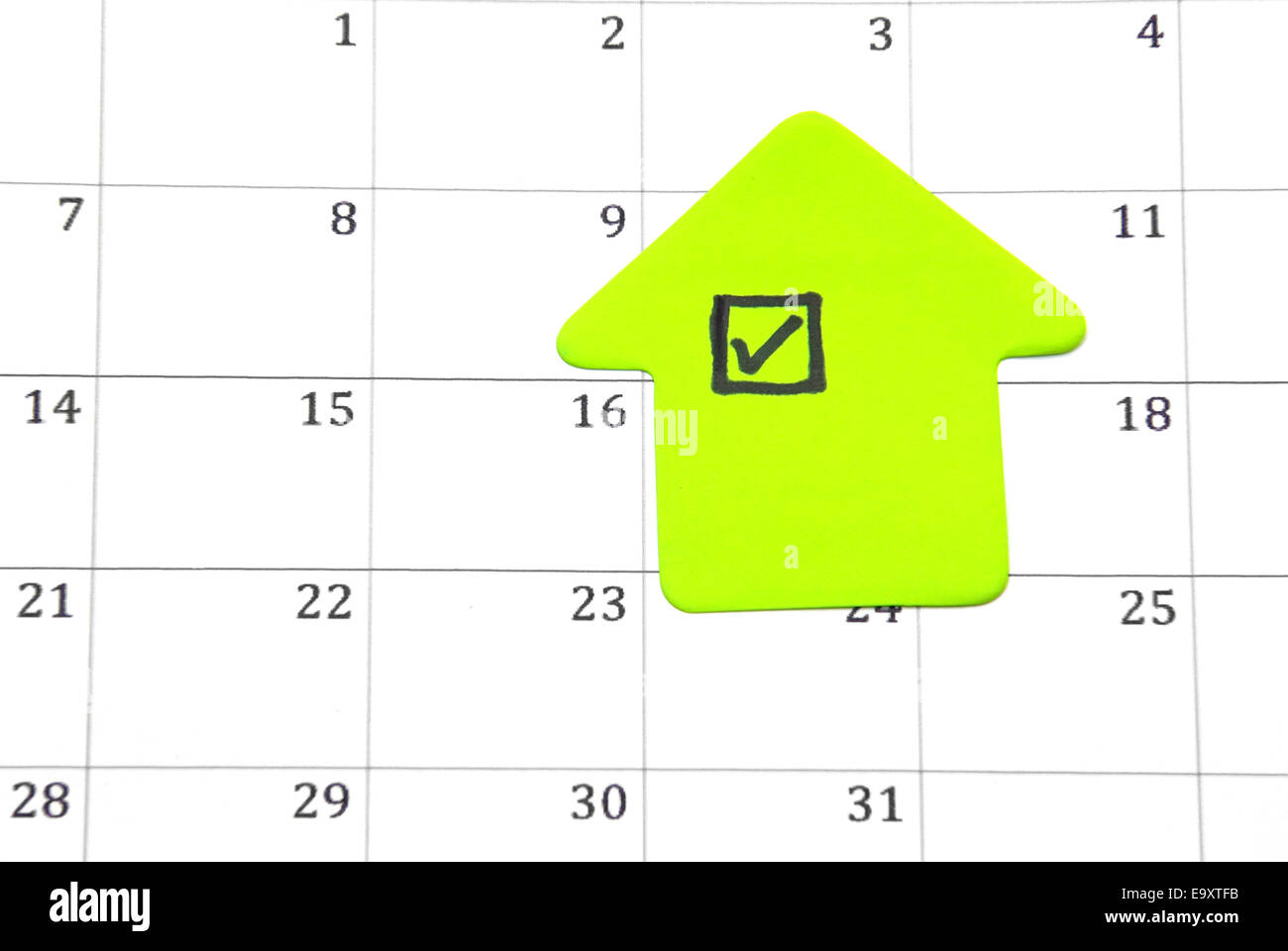 Close up image of a green checklist on a calendar. Stock Photo