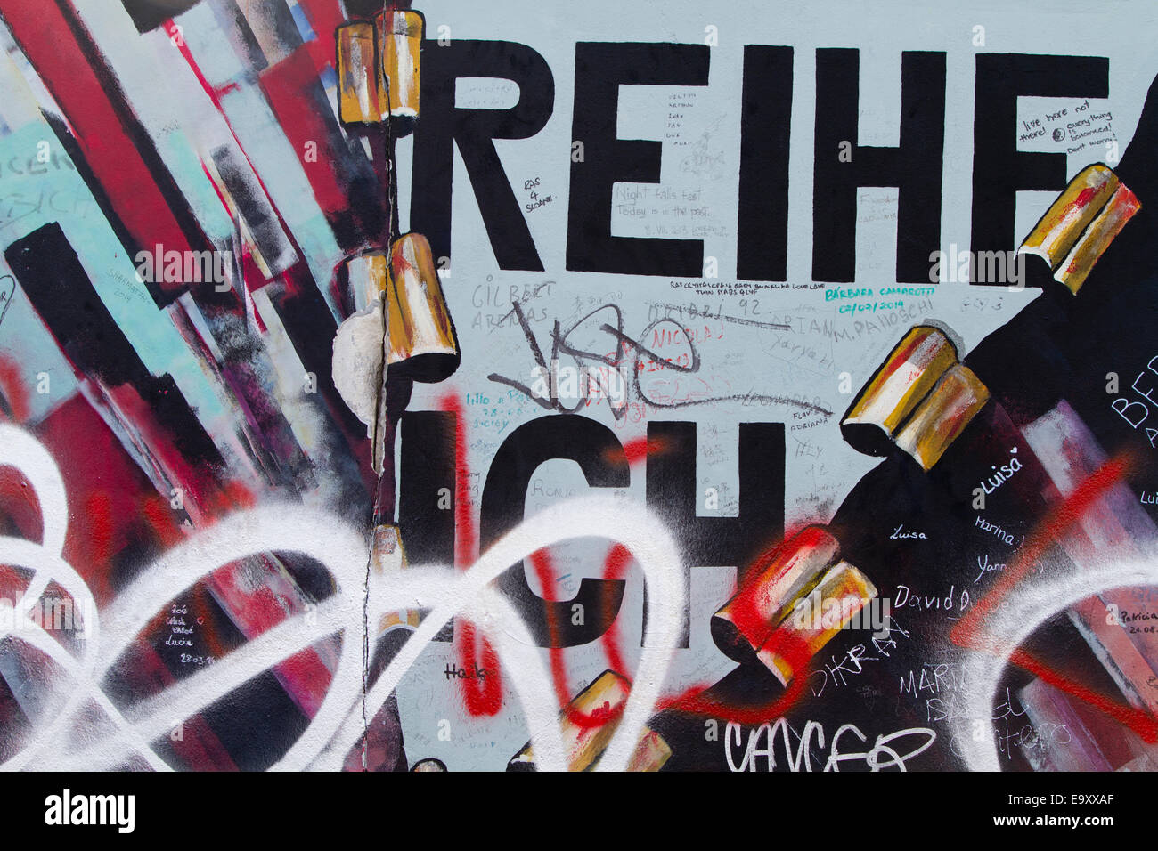 Graffiti street art Berlin wall tags reihe ich Stock Photo