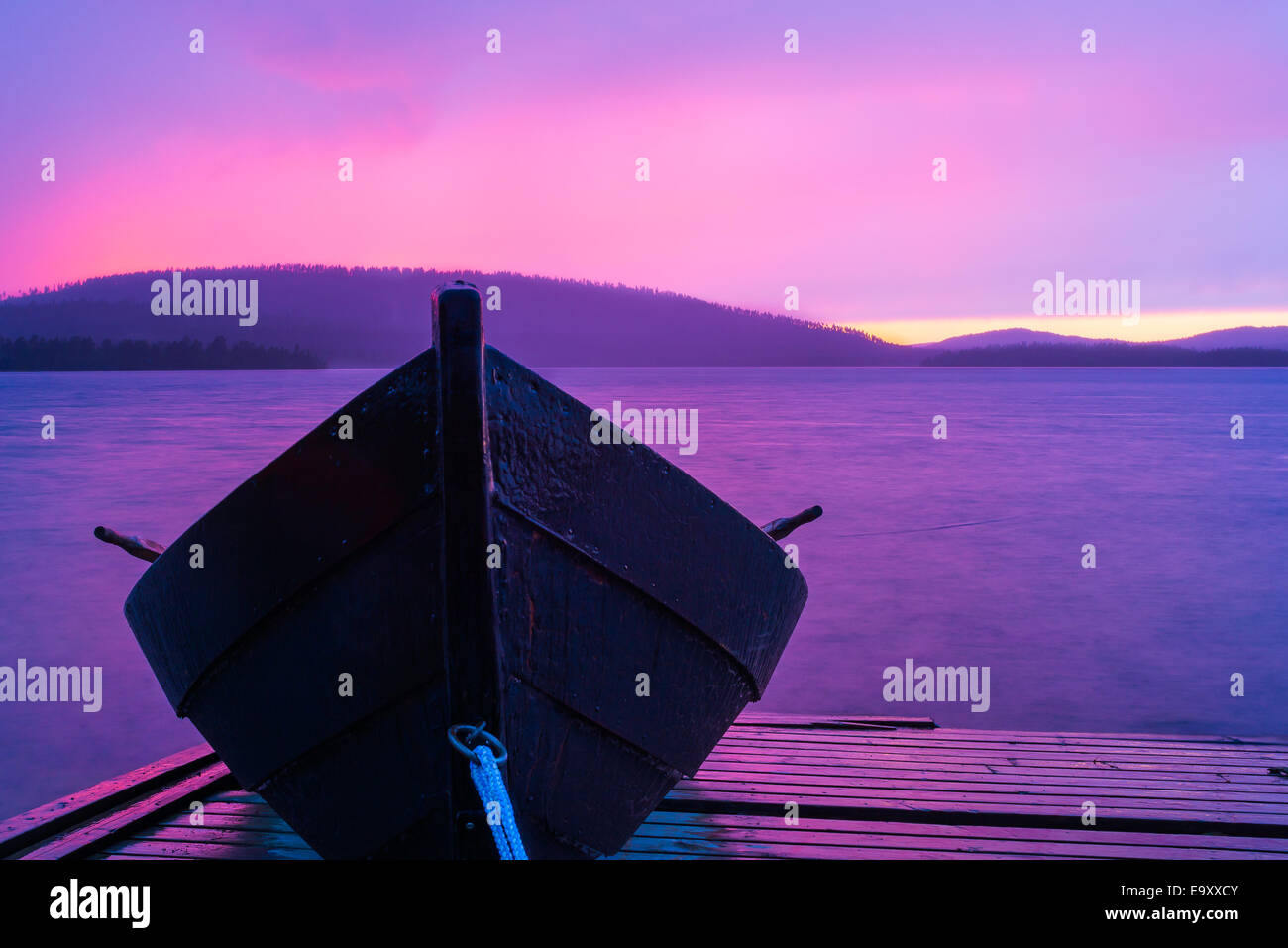 Lonely boat in colorful summer night. Stock Photo