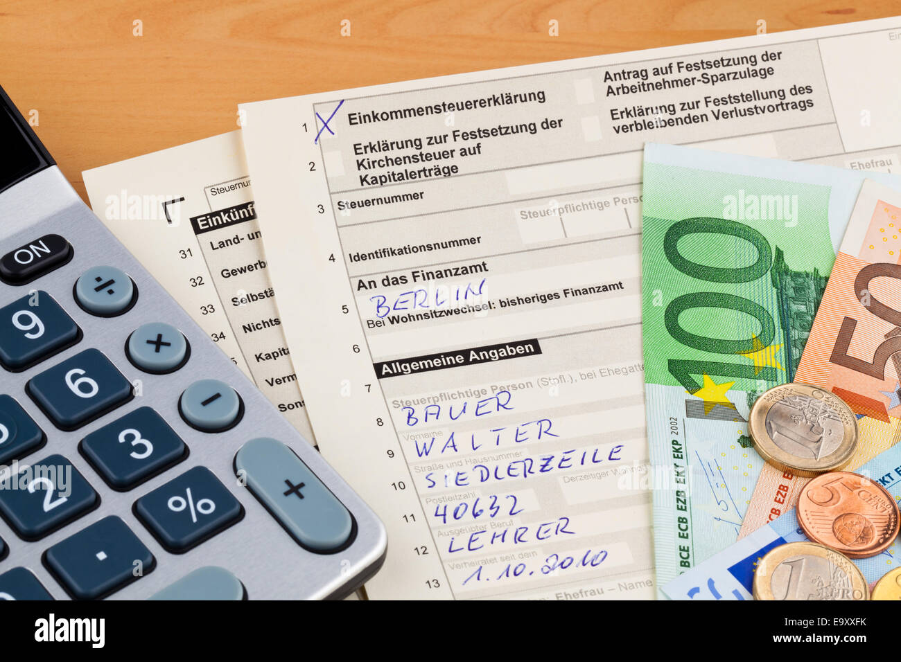 A German tax return for tax is filled in Stock Photo Alamy