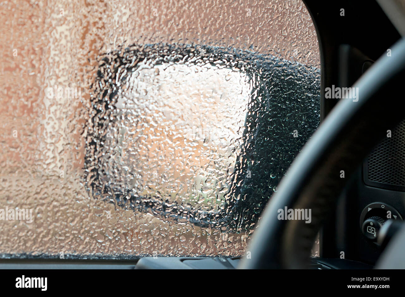 Ice on a frozen car window Stock Photo Alamy