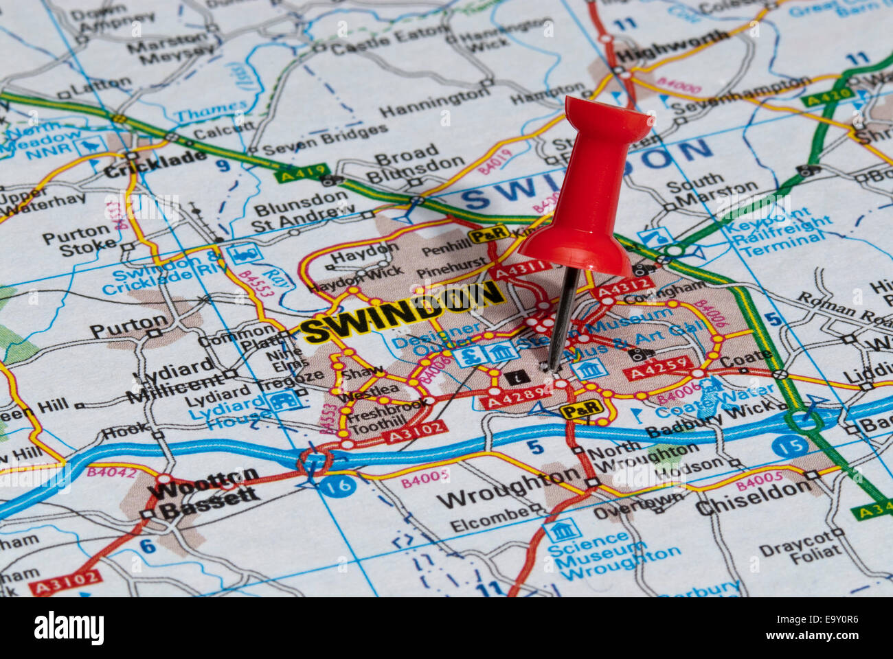 red map pin in road map pointing to city of Swindon Stock Photo