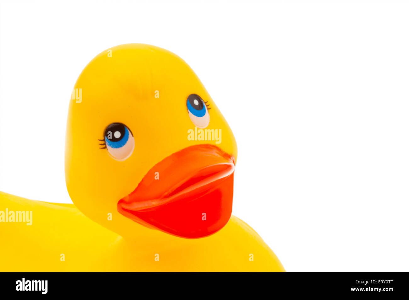 A yellow rubber duck on white background isolated Stock Photo - Alamy