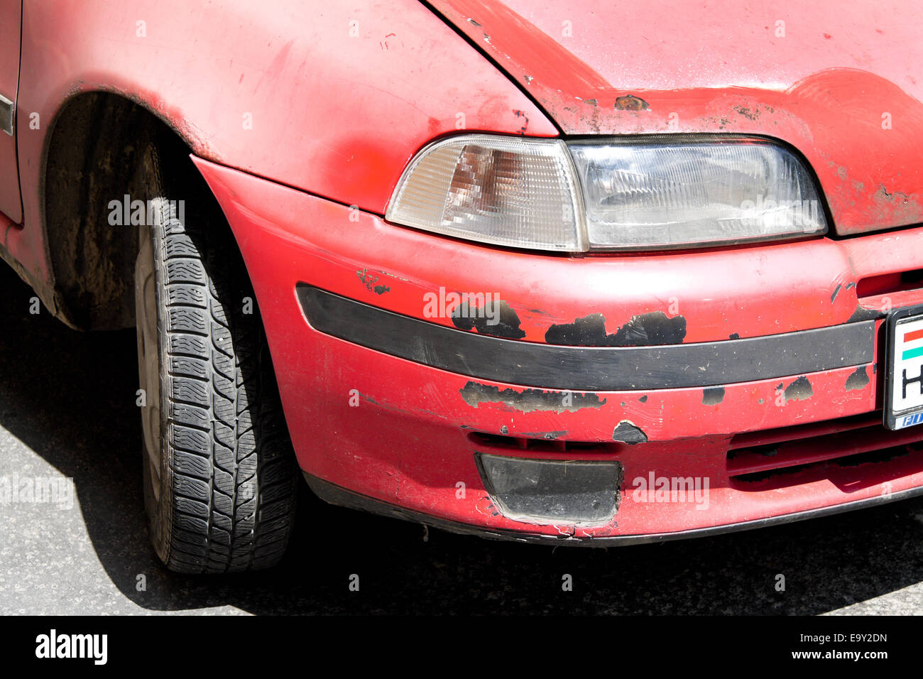 An old rusty car with a lot of rust damage Stock Photo - Alamy